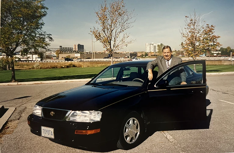 Hector Dupuis at TCI head office with Toyota Avalon in 1994